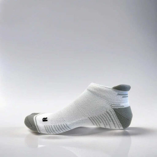 Low cut white and grey running socks with arch support and ventilation.